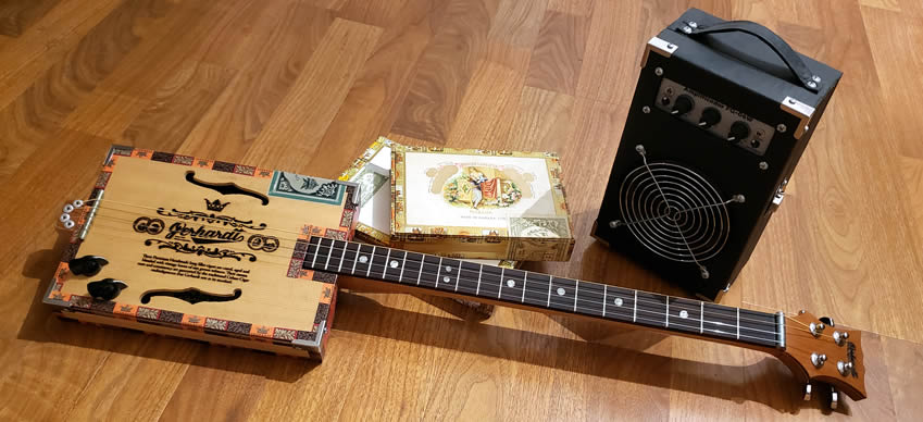 Como tocar una Cigar Box Guitar